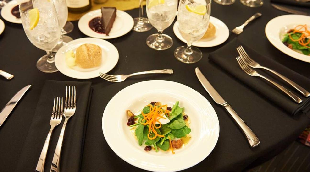 Plated food on table at event