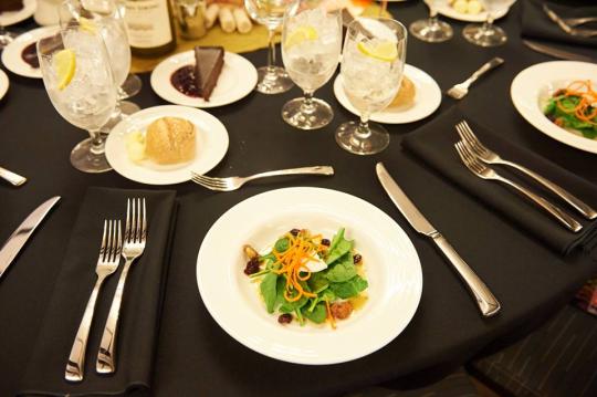 Plated food on table at event