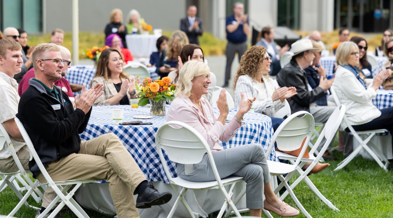 Audience Clapping at Event