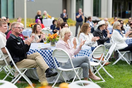 Audience Clapping at Event